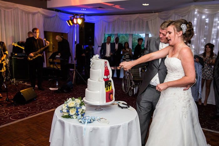 couple cutting cake