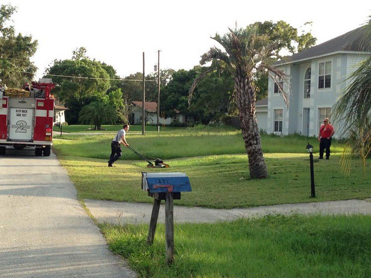 firetruck fireman mowing