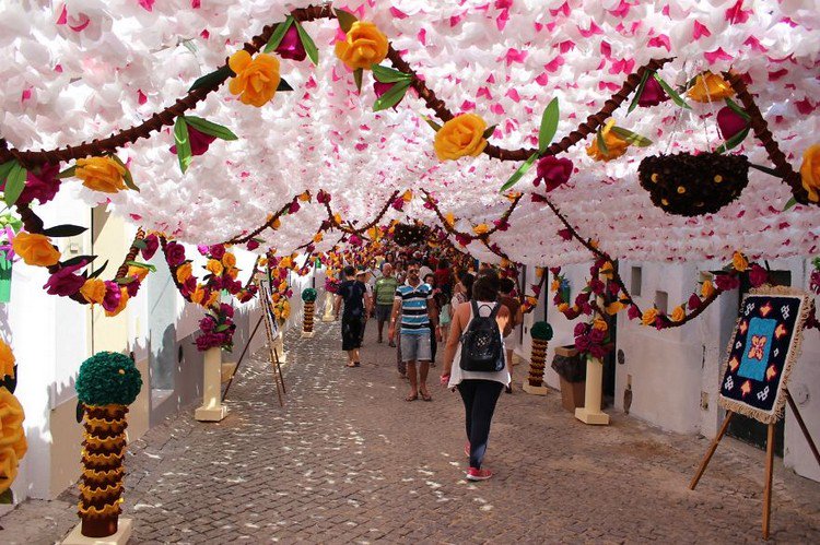 flower festival portugal colorful canopy