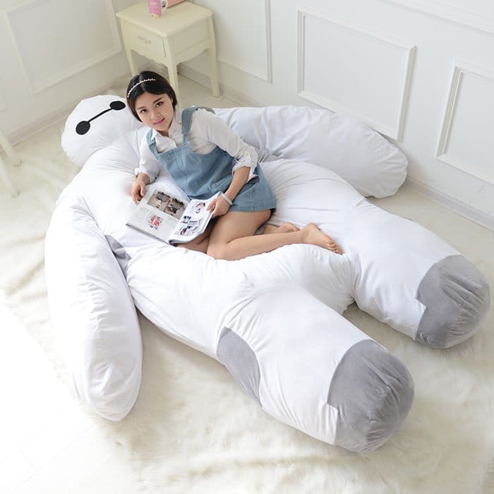 girl reading baymax bed