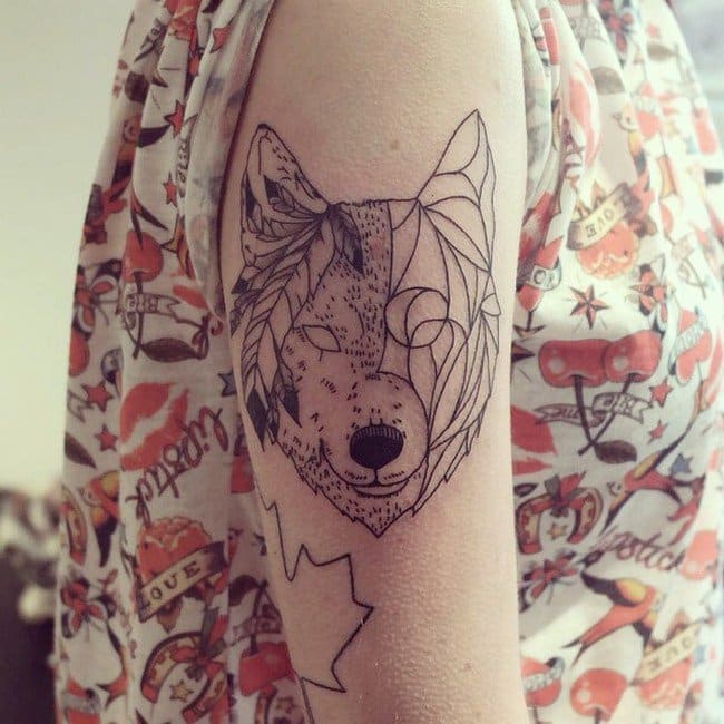 stylized wolf tattoo