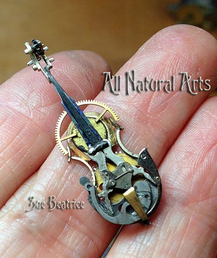 recycled-watch-parts-steampunk-sculptures-cello