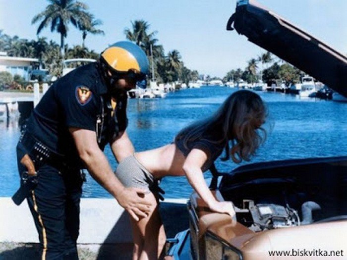 cop frisking woman