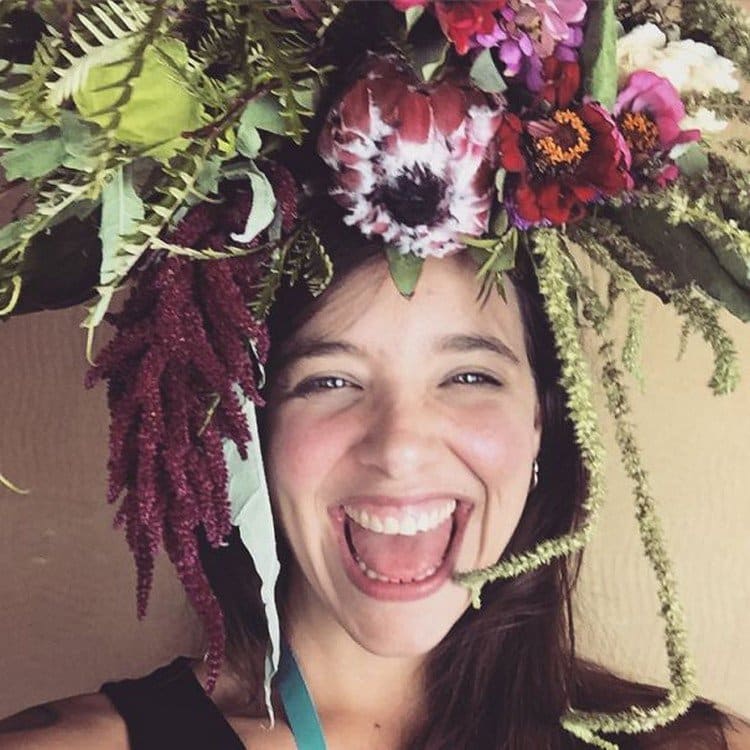 happy woman flowers on head