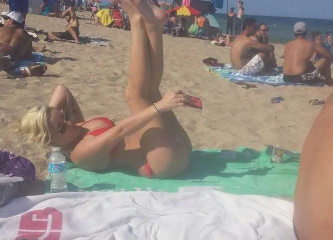 woman beach selfie