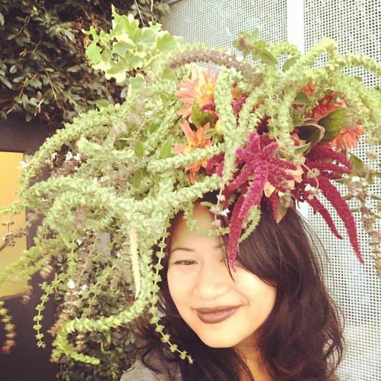 woman fancy flowers on head
