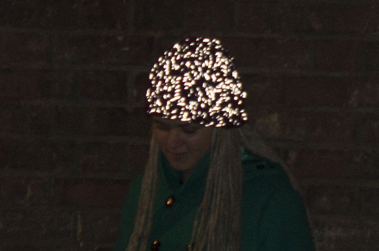 woman hat glowing