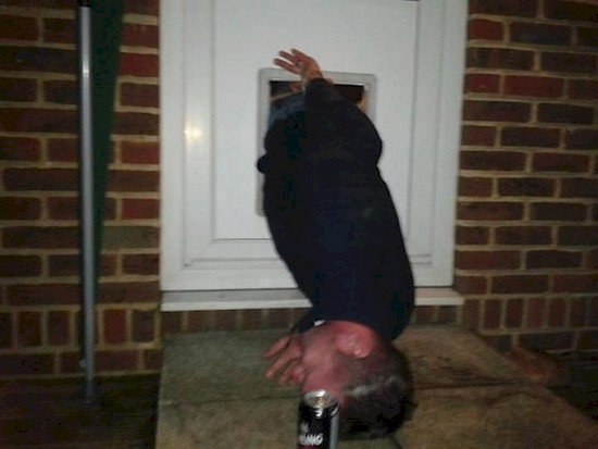 drunk man cat flap