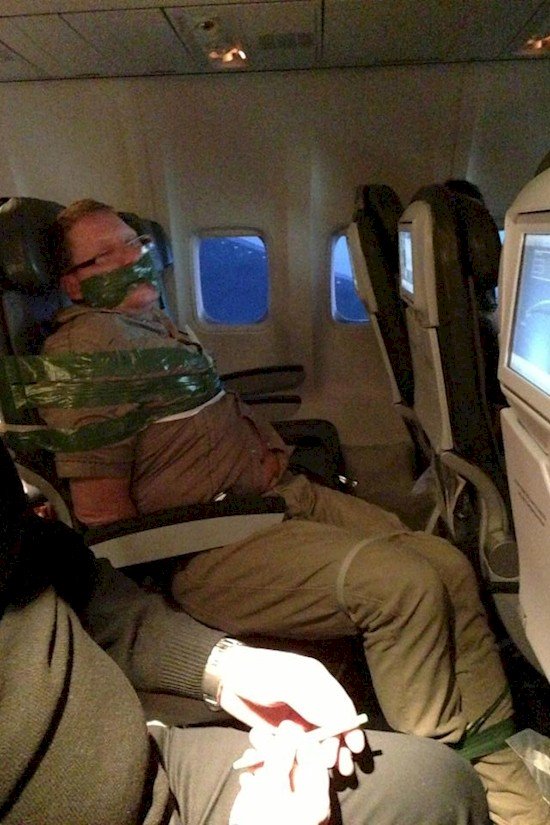 man tied up plane