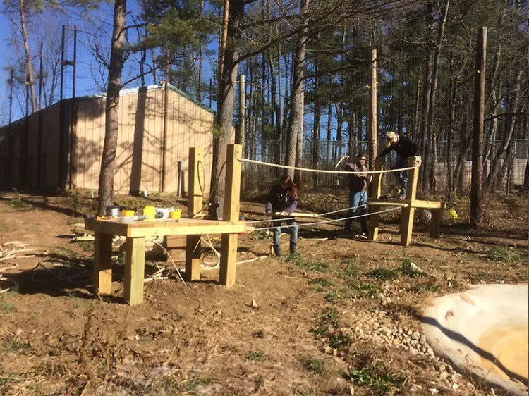 men building bridge