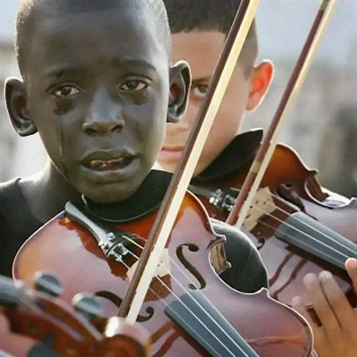 violin boy crying
