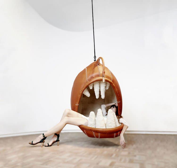 woman hanging chair teeth