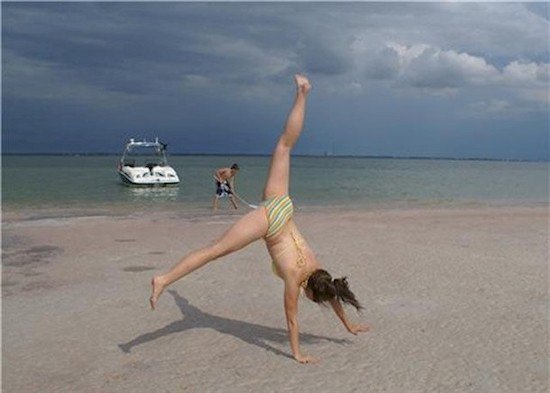 cartwheel beach woman