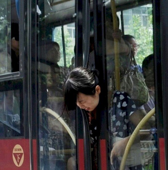 woman head stuck bus