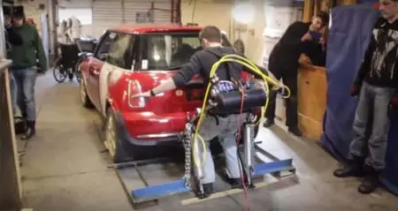 Jason Hobson Lifts 2,500-Pound Car Exoskeleton