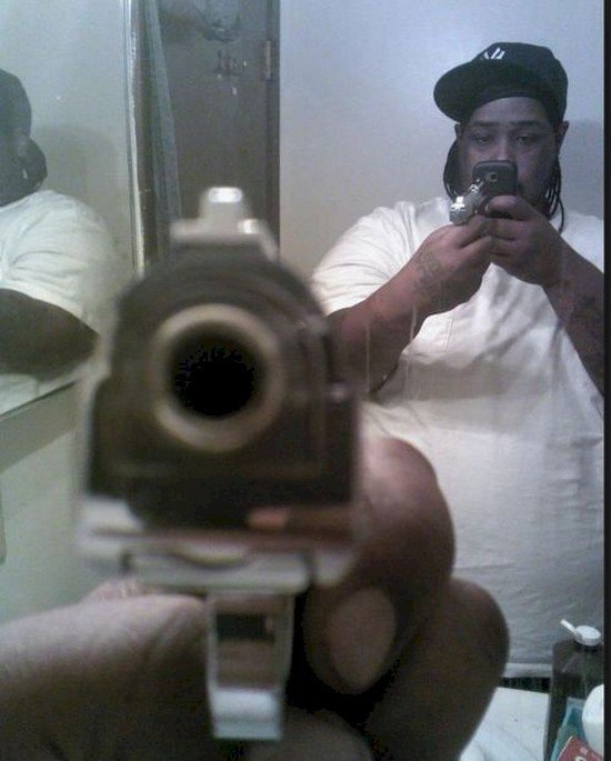 gun man selfie