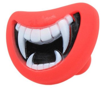 smiling fangs dog toy ball