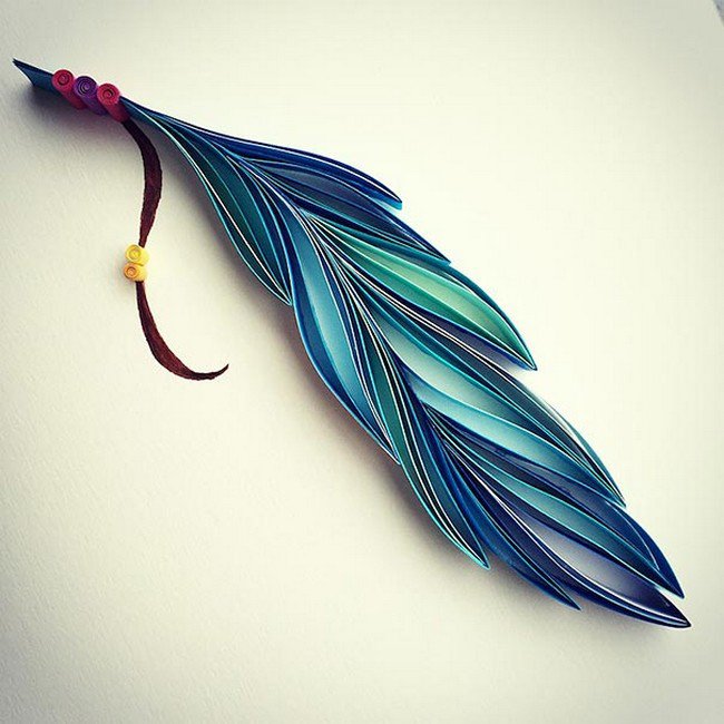 feather quilled paper