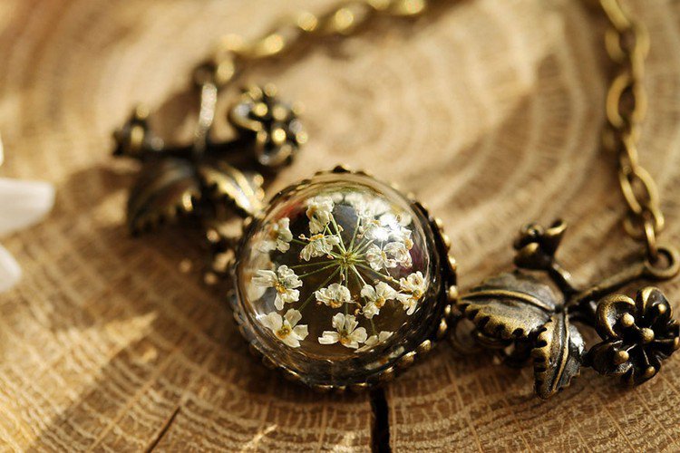 white floral terrarium