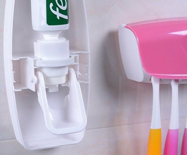 Toothpaste Dispenser And Brush Holder set