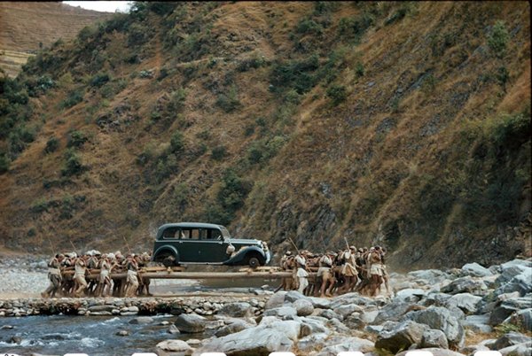 historical-photos-porters-move-car-across-river-nepal-1948