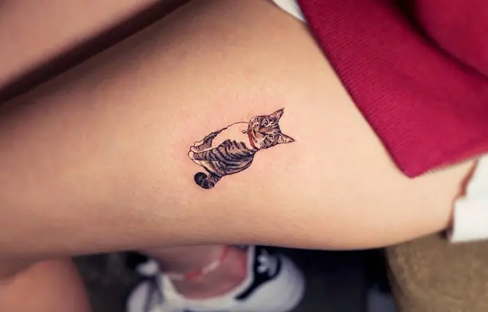 leg tattoo cat
