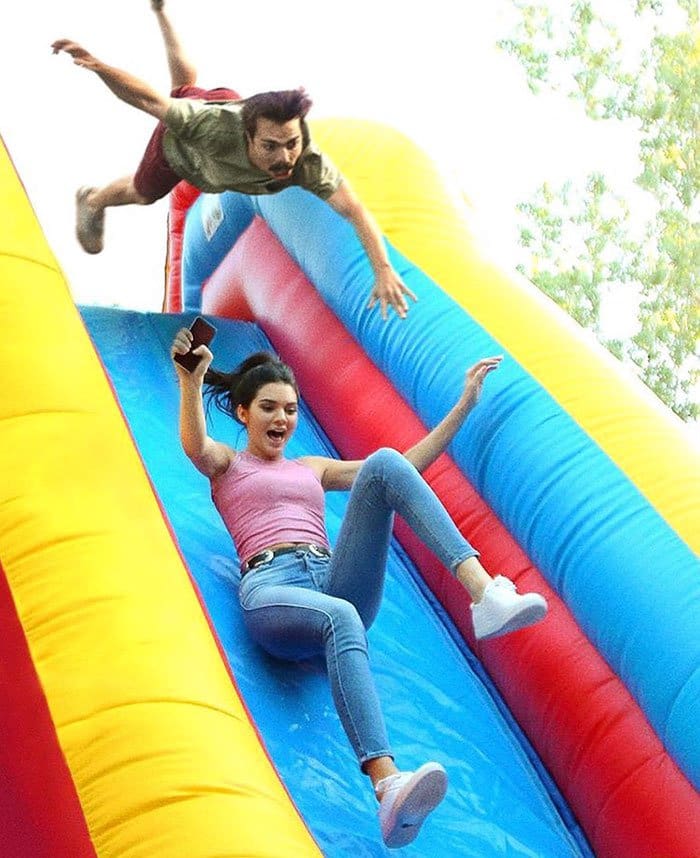 guy-photoshops-himself-into-kendall-jenner-photo-going-down-bouncy-slide