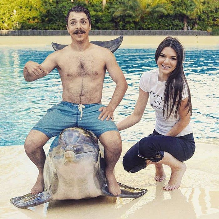 guy-photoshops-himself-into-kendall-jenner-photo-sitting-on-dolphin