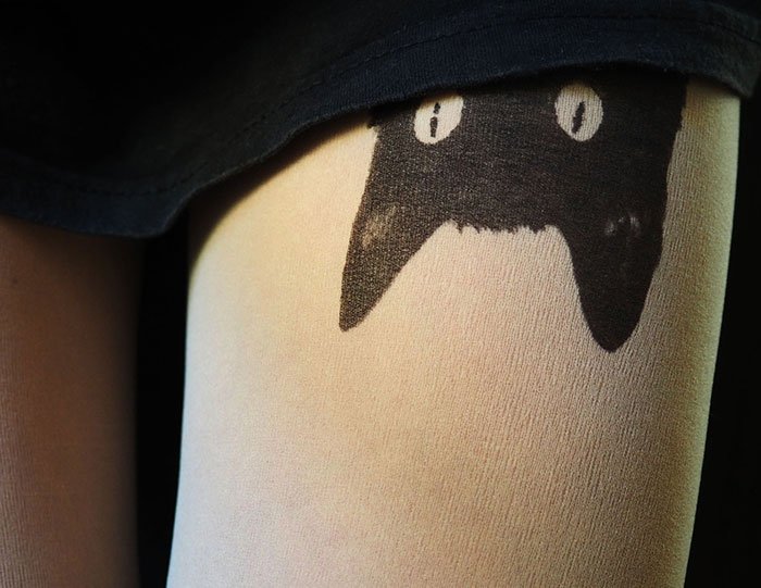 tattoo-tights upside down cat