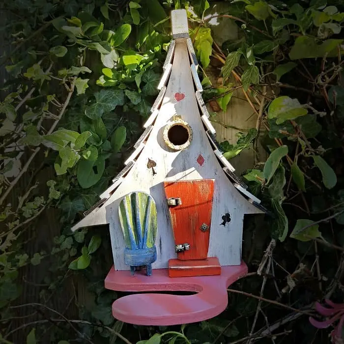 the abandoned alice in wonderland fairy tale bird houses