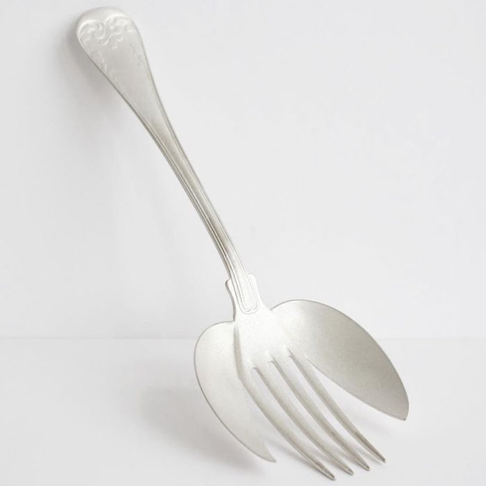 Experimental Cutlery fork in the middle of spoon