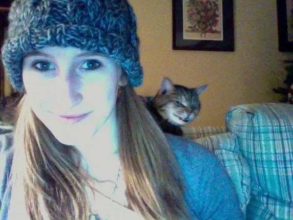 evil cats girl photobomb