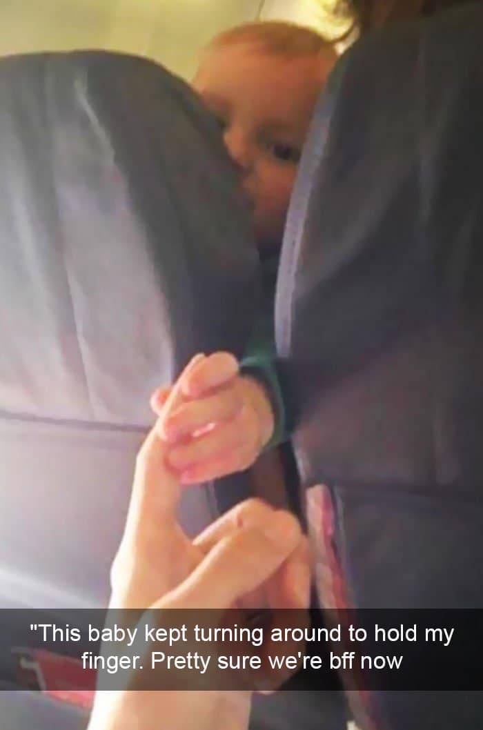 funny-things on plane baby hold finger