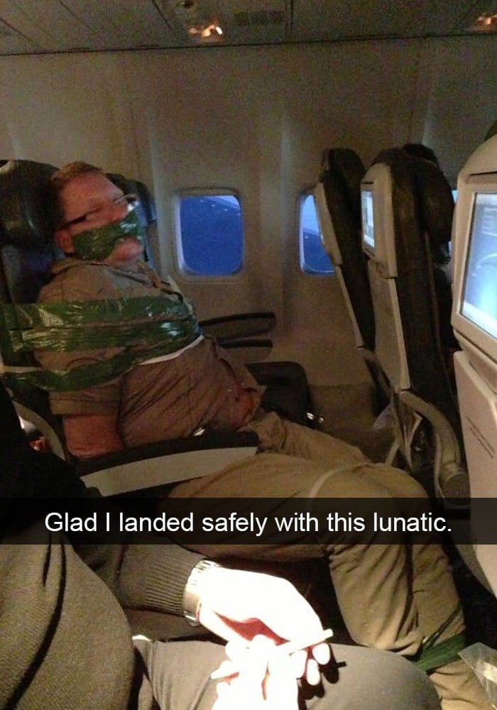 funny-things on plane guy tied up