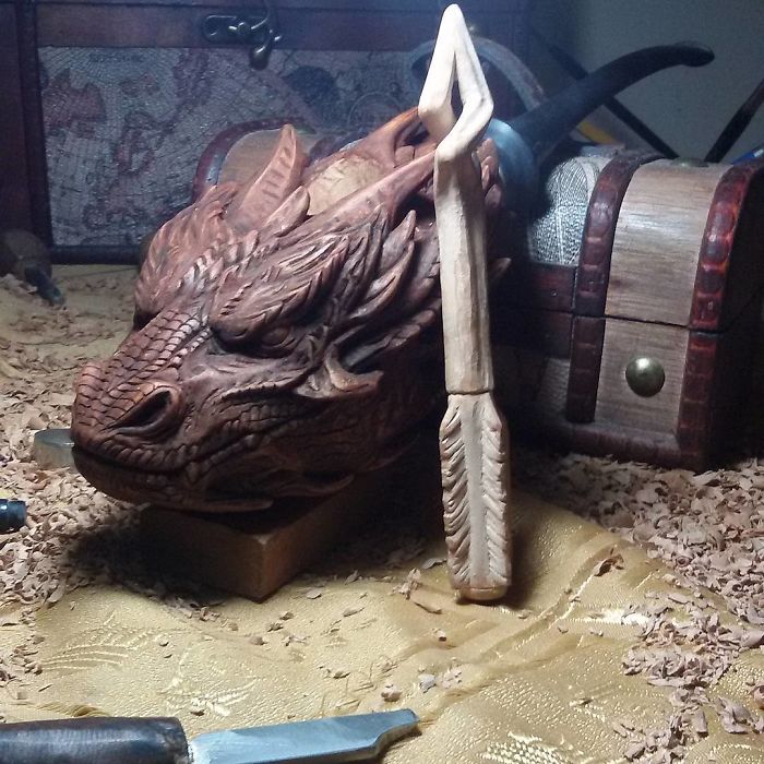 hand carved dragon pipe and arrow