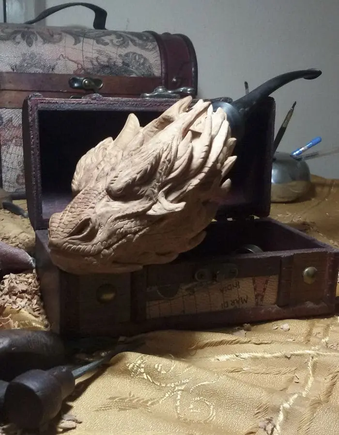 hand carved dragon pipe side view