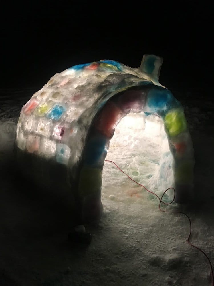 building an igloo glowing with lights