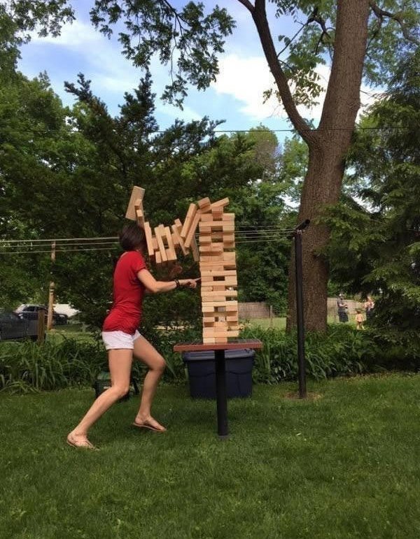 girl playing giant jenga