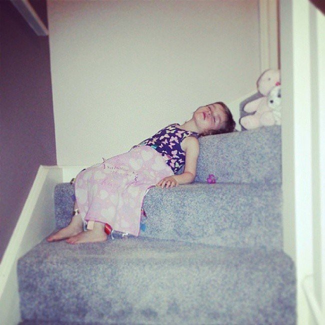 kids sleeping weird places stairs
