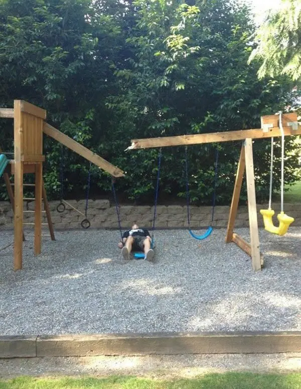 man on floor broken swing