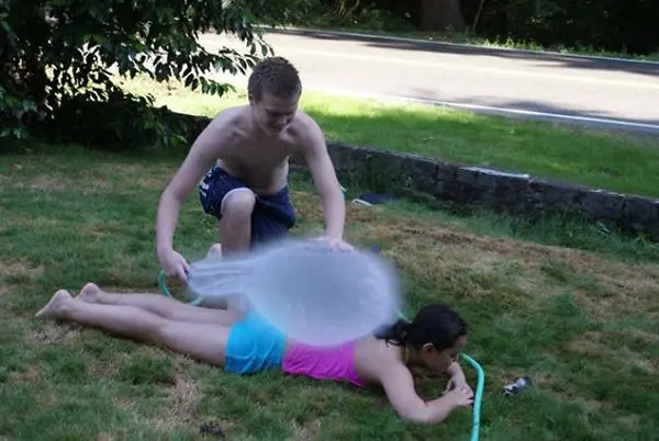 balloon exploding on girl