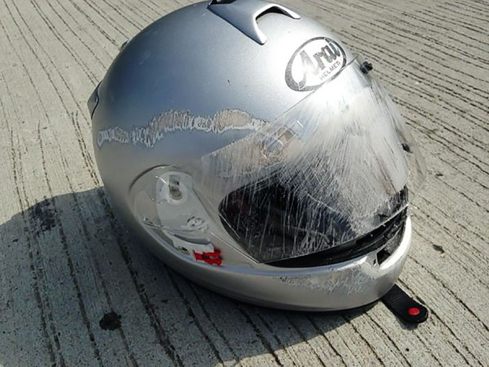 face scratched helmet