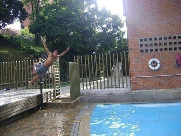 guy about to miss pool and hit floor