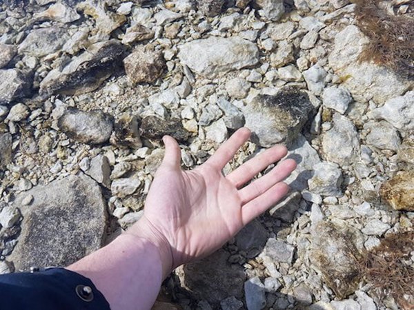 hand in really clear water