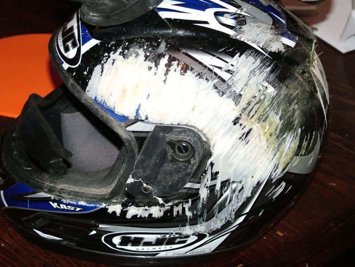 heavily scratched bike helmet