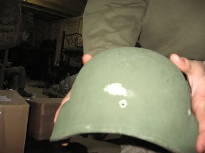 helmet with bullet hole