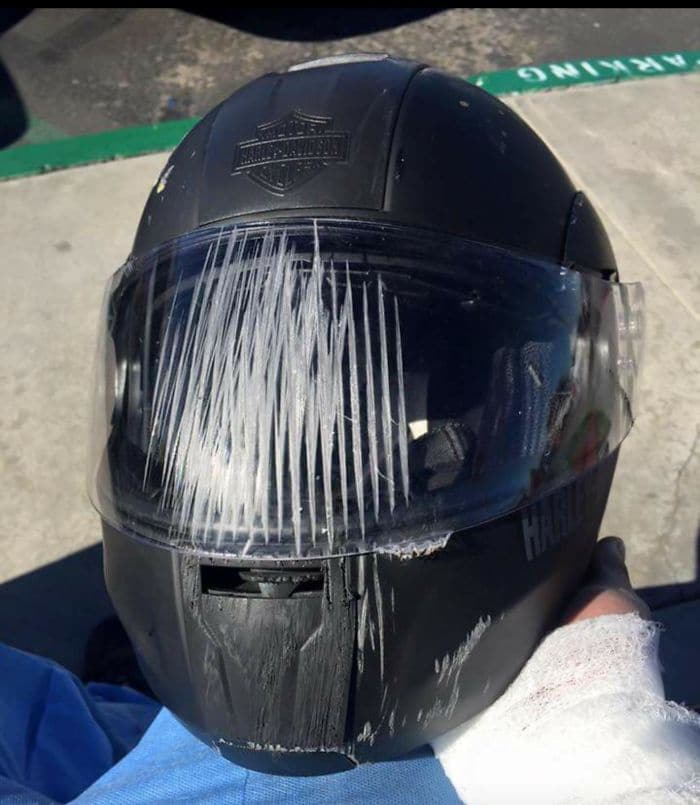 scratched motorbike helmet