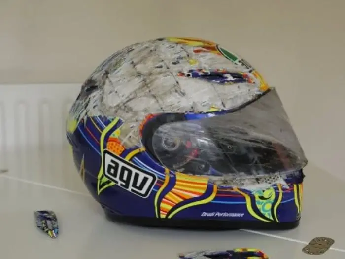 severely damaged bike helmet