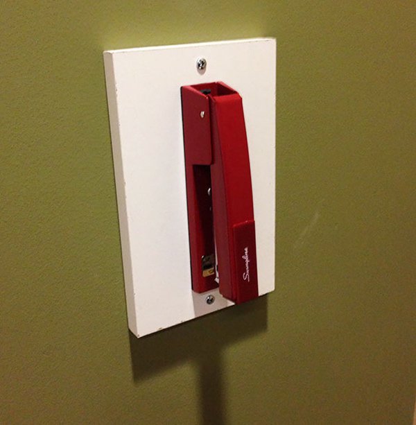 stapler mounted to wall