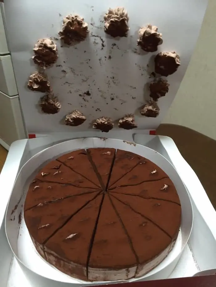Annoying Things cake topping stuck to box